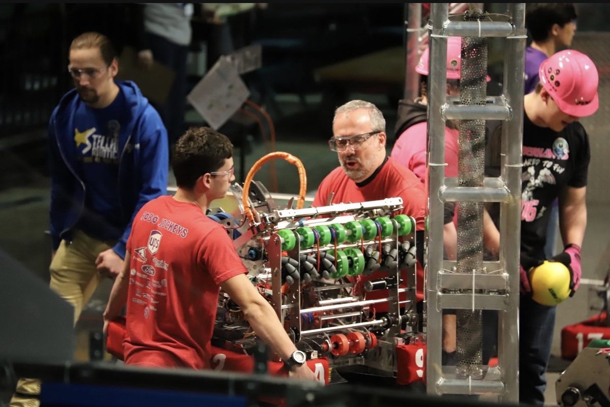 Team 5492 Robo Jockeys with Elevator Ed at competition
