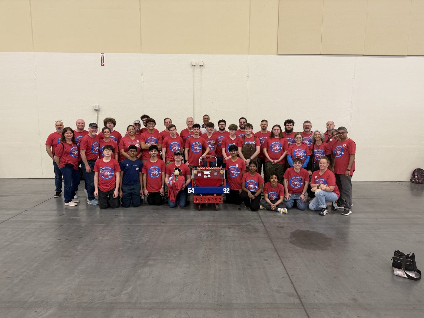 FRC Team 5492 Winner's Circle Robo Jockeys — team and robot at competition